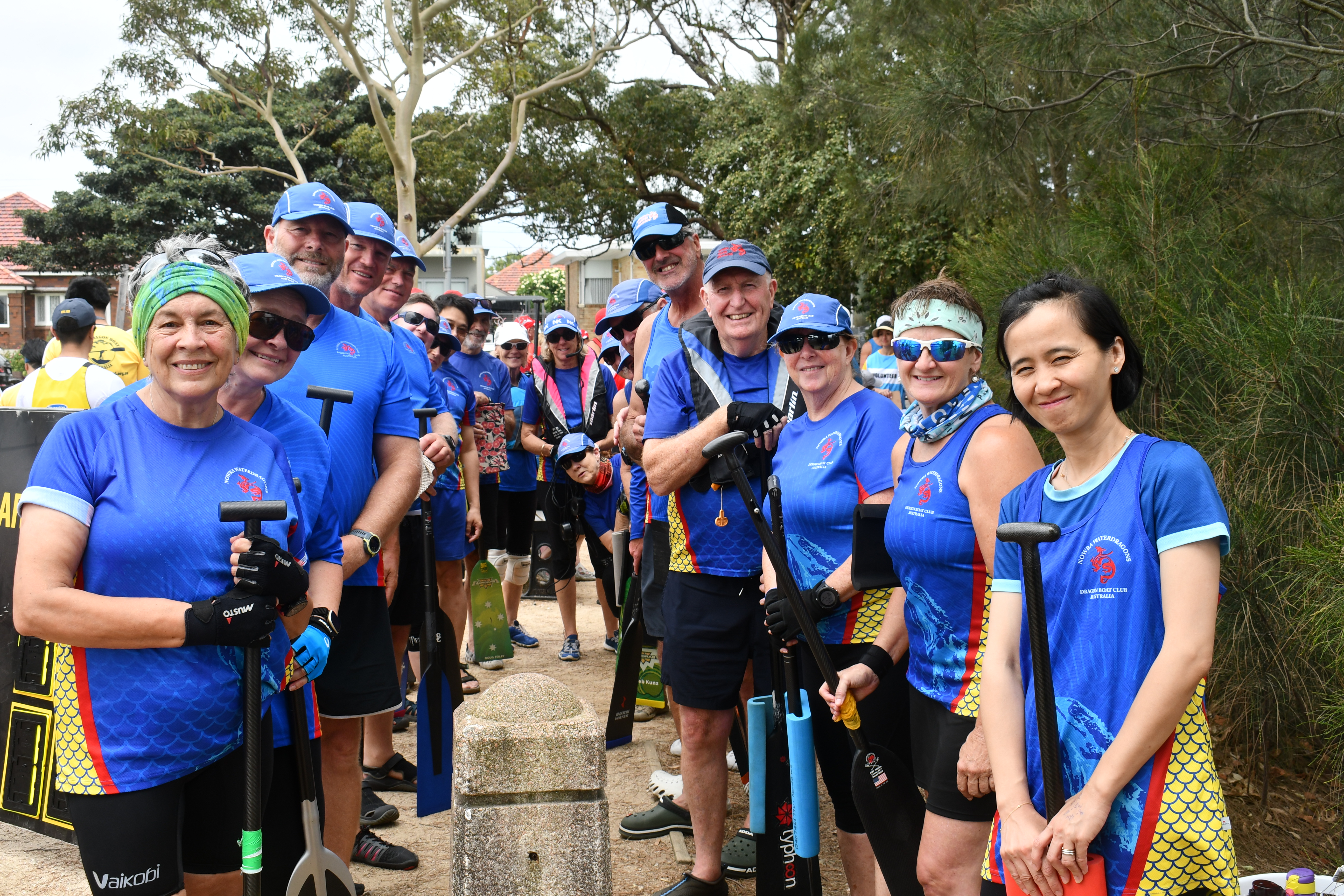 Dragon boat crew standing together